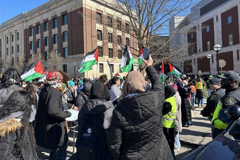 students holding palestine flags