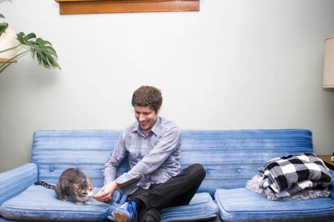 Reporter Tom Perkins and his cat, Ling Ling