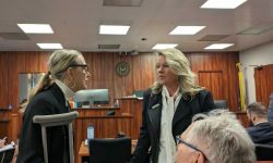 two women, Meshawn Maddock and Michele Lundgren, in a court room
