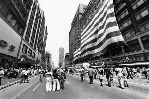 NEW LIFE FOR SITE?: The J.L. Hudson store’s enormous flag was unfurled on its Woodward Avenue facade on Flag Day 1976. The banner, called the world’s largest at the time, now rests in the Smithsonian Institution in Washington, D.C. At a policy conference in Detroit last week, Matt Cullen of Rock Ventures announced a proposal to redevelop the former Hudson’s location. (Photo courtesy of the Tony Spina collection: Walter P. Reuther Library, Wayne State University)