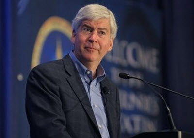 Michigan Gov. Rick Snyder has hit the road in recent weeks 
