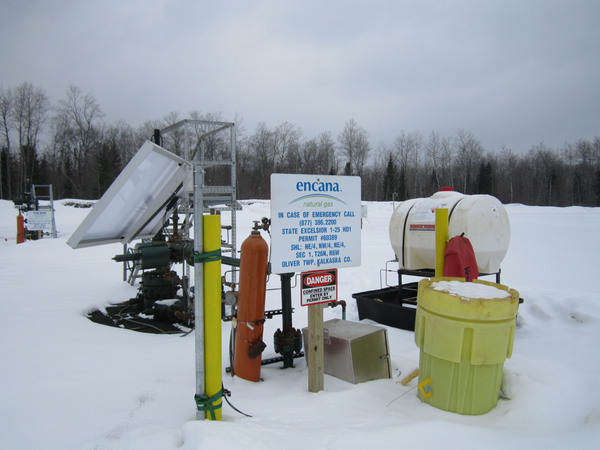An Encana well on state forest land not far from the Manistee River headwaters. Encana has brought well-paying jobs, allegations of bid-rigging, and some nagging health and environmental questions to Michigan.
