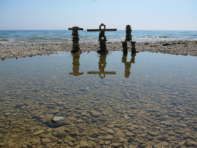 Runners have to occupy their minds as they go about their training. One thought: So what is it with those beach cairns on Mackinac? (Photo by Flickr user Julie Weatherbee; used under Creative Commons license)