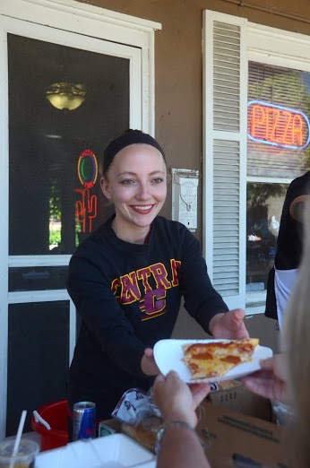 Mariah Prowoznik is waitressing this summer near her Grand Rapids home to help pay for her fifth year at Central Michigan University. Only one in five CMU students earns a bachelor’s degree in four years. The rate is even lower at some other public universities. (photo by Sam Zomer)