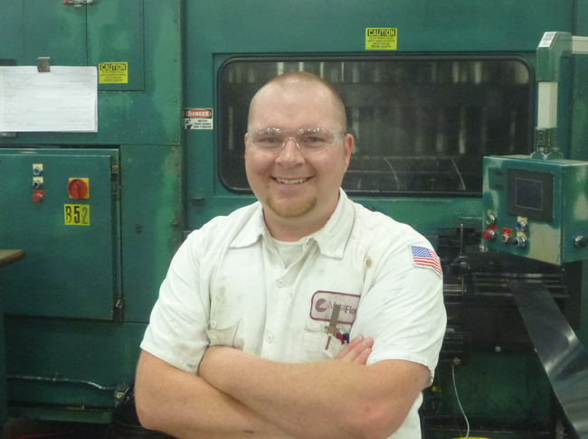 Kyle Hubers earns more than $20 an hour as a toolmaker – a position many Michigan employers can't fill – at Metal Flow in Holland.