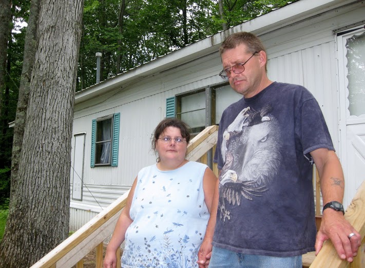 Randy and Delores Libey moved to a rented trailer in Lake County after child protective services workers warned they could lose custody of her daughter, because their former home had no heat or running water. (photo by Pat Shellenbarger)