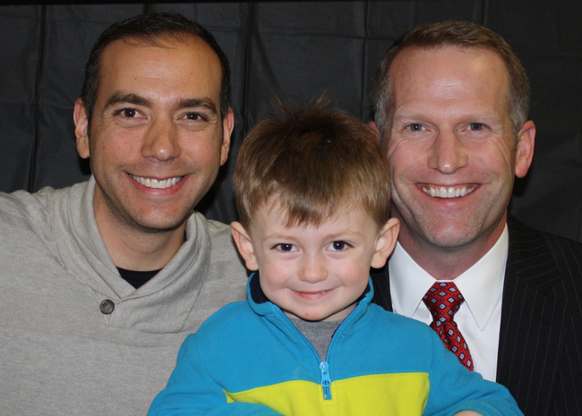 Kent Love-Ramirez, right, was communications director at the MSU College of Law before moving with his husband, Diego Love-Ramirez and son Lucas to Minnesota, which recognizes same-sex marriage. (Courtesy photo)