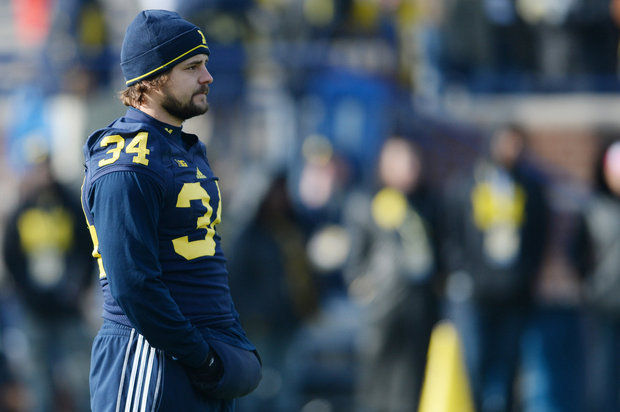 Four years elapsed between the time that a U-M freshman accused U-M football player Brendan Gibbons of sexual assault at a frat house and the date that the university removed him from school, raising criticism among advocates for sexual-assault victims. (photo courtesy of MLive)