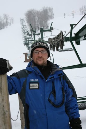 Robbie Younce, a single dad, earns $11 an hour as a ski-lift operator at the Nub’s Nob Ski Area outside Harbor Springs. He’s grateful for the job, but job prospects are more fluid in the summer months.
