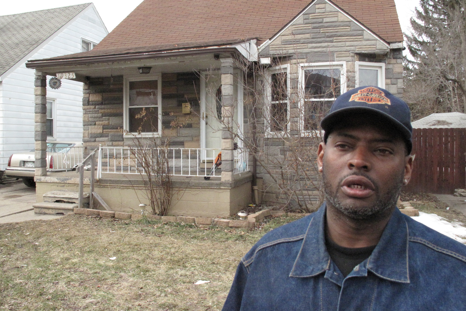 Detroit resident Rodney Frazier, a pressman who lives on Teppert Street, has three abandoned homes across from his own. (photo by Bill McGraw)