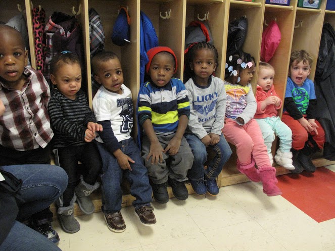 Seven kids for seven cubbies. Parents at Starfish Family Services praise the center for creatively teaching their children. These children are age 2. 
