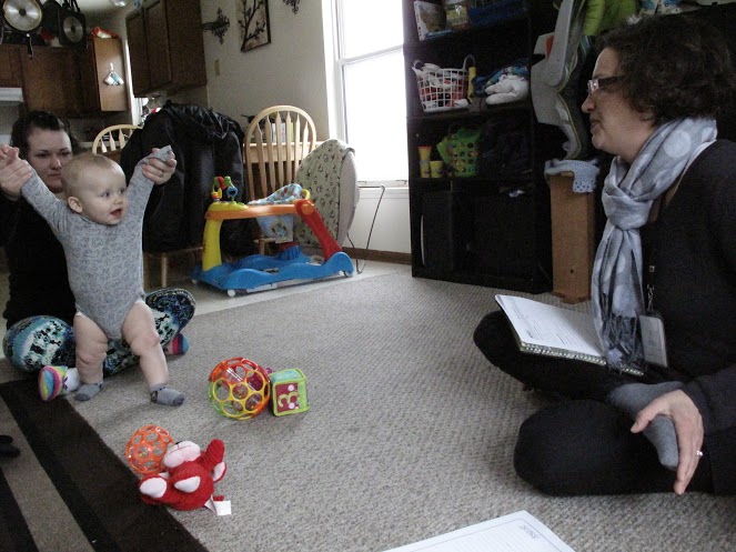 Nathan Rice, 8 months, is among an estimated 25,000 Michigan children receiving home-visitation services for at-risk families. A new study indicates 260,000 children in the state could benefit from the program. 