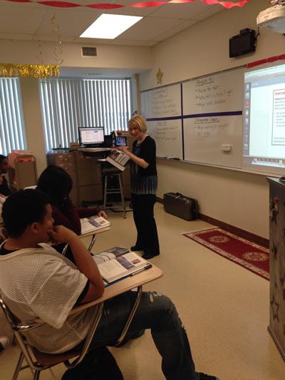 An intensive reading remediation program to improve literacy skills was one of several key strategies to raise student performance at Hazel Park High. Teacher Amy MacIntosh leads an English class. (Bridge photo by Keith A. Owens) 