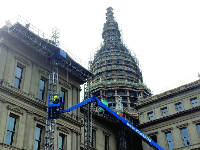 Skilled-trades workers in Michigan, like those repairing the capitol dome in Lansing, will likely see a drop in wages if a prevailing wage repeal becomes law. (photo by Lindsay VanHulle)