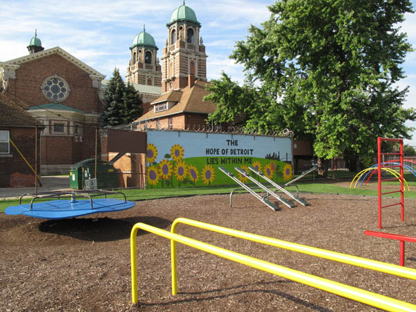  A spick-and-span Szafraniec Park, owned by the city of Detroit and maintained by the Hope of Detroit Academy, sits behind St. Francis d'Assisi Church, on Buchanan and Wesson.