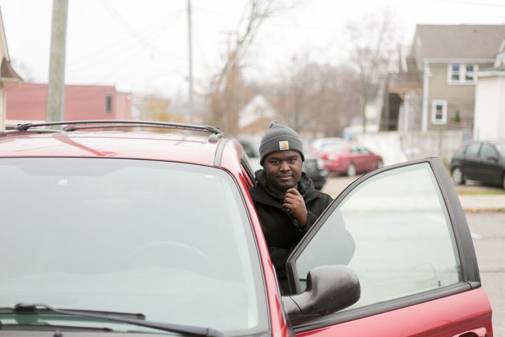 Thanks to the generosity of Bridge Magazine and MLive readers, Eastern Michigan student Ramone Williams can now afford a place to live and can fix the balky van that has served as his home. (Bridge photo by Brian Widdis) 