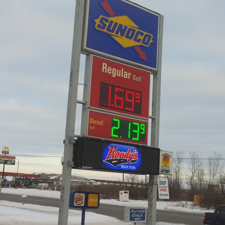 With gas prices tumbling below $1.90 a gallon in Michigan, motorists might want to start paying a hike in gas taxes this year rather than waiting until 2017. (Bridge photo by Mike Wilkinson) 