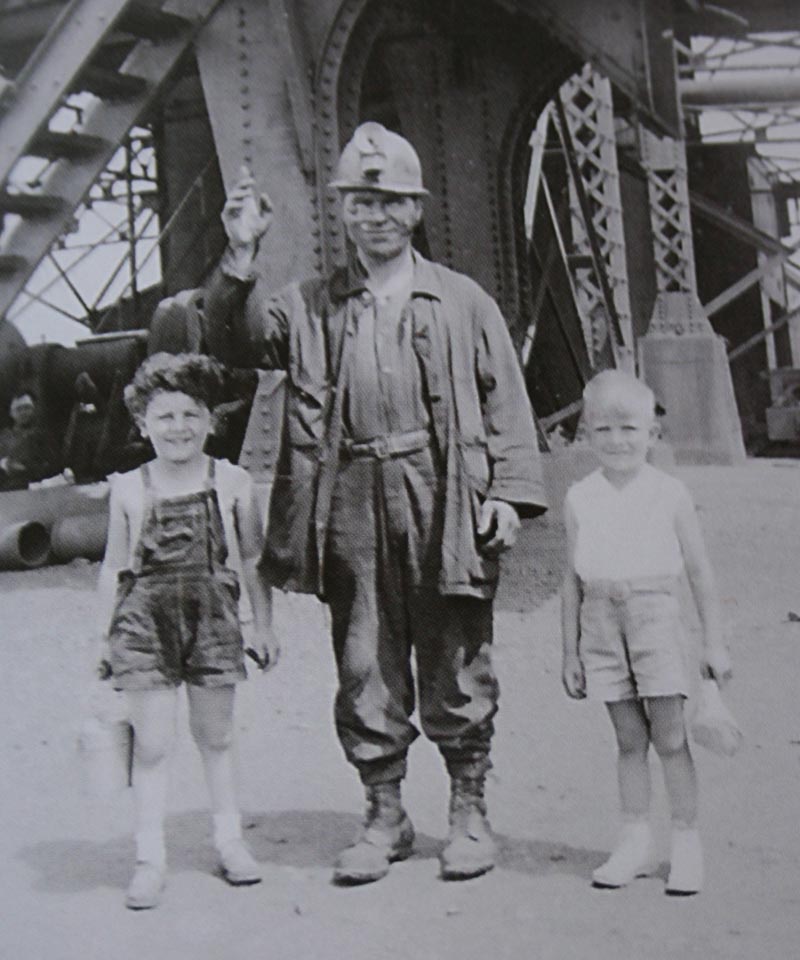 Pietro Frustaglio stands with his youngest son, Vito, at right, and another child. (Courtesy photo)