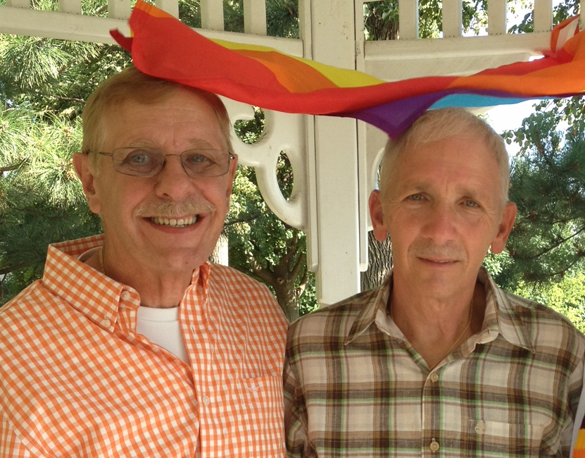 John Celletti, left, and his husband Joseph Madej, married in Iowa before same-sex marriage became the law of the land. Celletti’s orientation is part of his identity as a Democrat, but not the only part. (Courtesy photo)