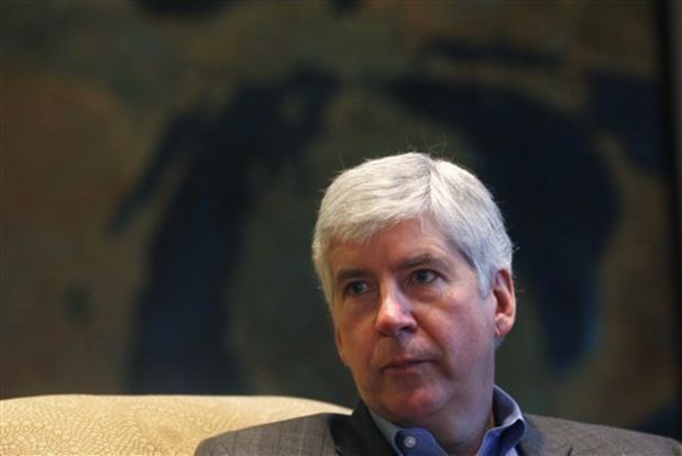 Michigan Gov. Rick Snyder’s slow, defensive response to the lead-poisoning water crisis in Flint is being picked apart by university business and leadership experts. (photo courtesy of mlive)