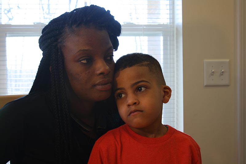 Grand Rapids resident Myichelle Mays has taken her son, De'Mari, to the emergency room a half dozen times for asthma attacks. (Bridge photo by Ted Roelofs)