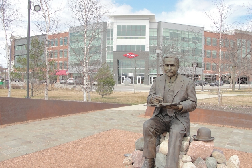  At the entrance to the Dow Chemical Co. Founder's Garden, a statue of founder Herbert H. Dow hints at the company's importance to its hometown. The gardens are at the site of the company's original headquarters along the Tittabawassee River near downtown. (Bridge photo by Lindsay VanHulle) 
