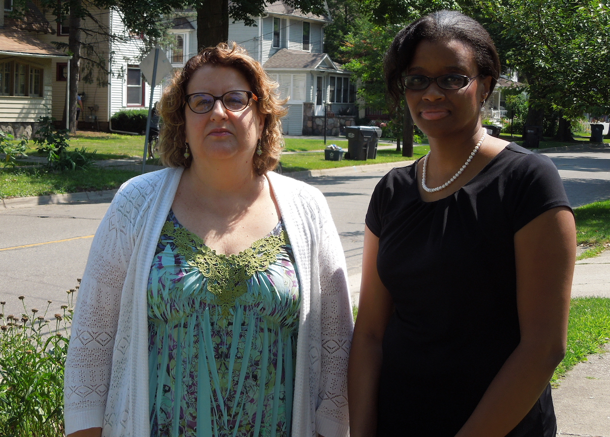 Wendy Flora, left, and Charlae Davis, of Interfaith Strategy for Advocacy & Action in the Community, have worked for years to reduce violence in Kalamazoo. (Bridge photo by Ron French)