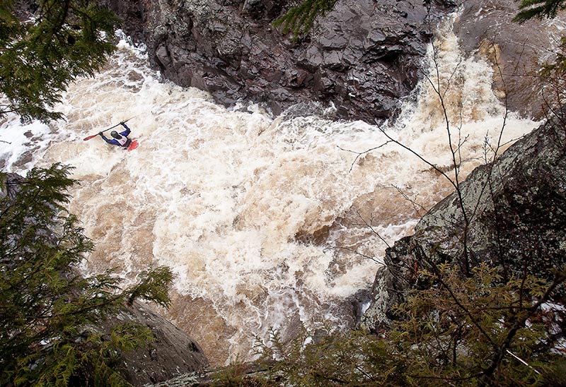 Outdoor adventurers in Duluth capitalize on everything from Great Lakes surfing to mountain biking to whitewater kayaking, as pictured here. (Photo by Hansi Johnson) 