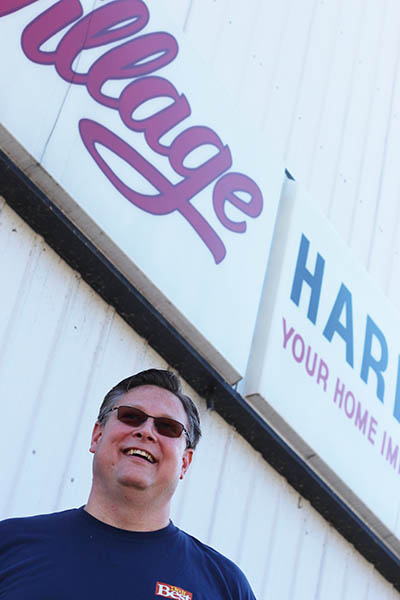 Kurtis Norton, 42, came to Roscommon 16 years ago after buying Village Hardware. When he did, all the stores around him were occupied. Now, vacancy signs are all around as the village struggles to lure and keep businesses, a trend consistent across northern Michigan. (Bridge photo by Mike Wilkinson) 