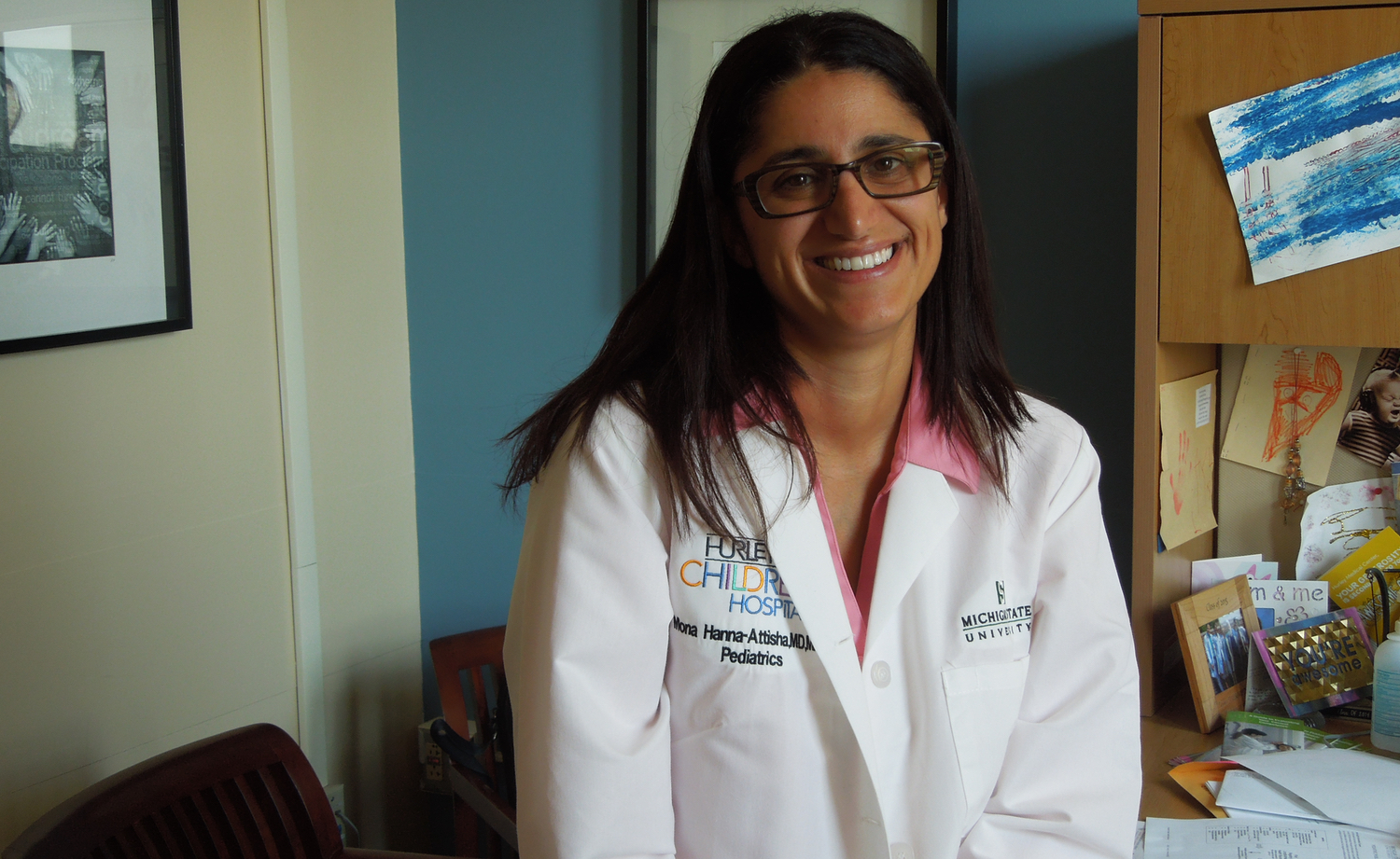 Dr. Mona Hanna-Attisha, the Flint pediatrician hailed as a hero in its water crisis, says she’s an optimist, but with nearly $600 million pledged or delivered to the city to mitigate its water crisis, the task is still thorny and the undone work enormous. “These kids did nothing wrong,” Hanna-Attisha said. “We owe it to them.” (Bridge photo by Ron French) 