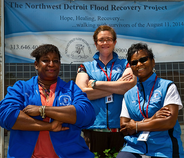 The Rev. Rebecca Wilson, middle, project coordinator of the Northwest Detroit Flood Recovery Project, helped spearhead volunteer efforts in northwest Detroit long after government help faded. But her group’s funding lapses at year’s end. (Photo by P.A. Rech/palanimages.com) 