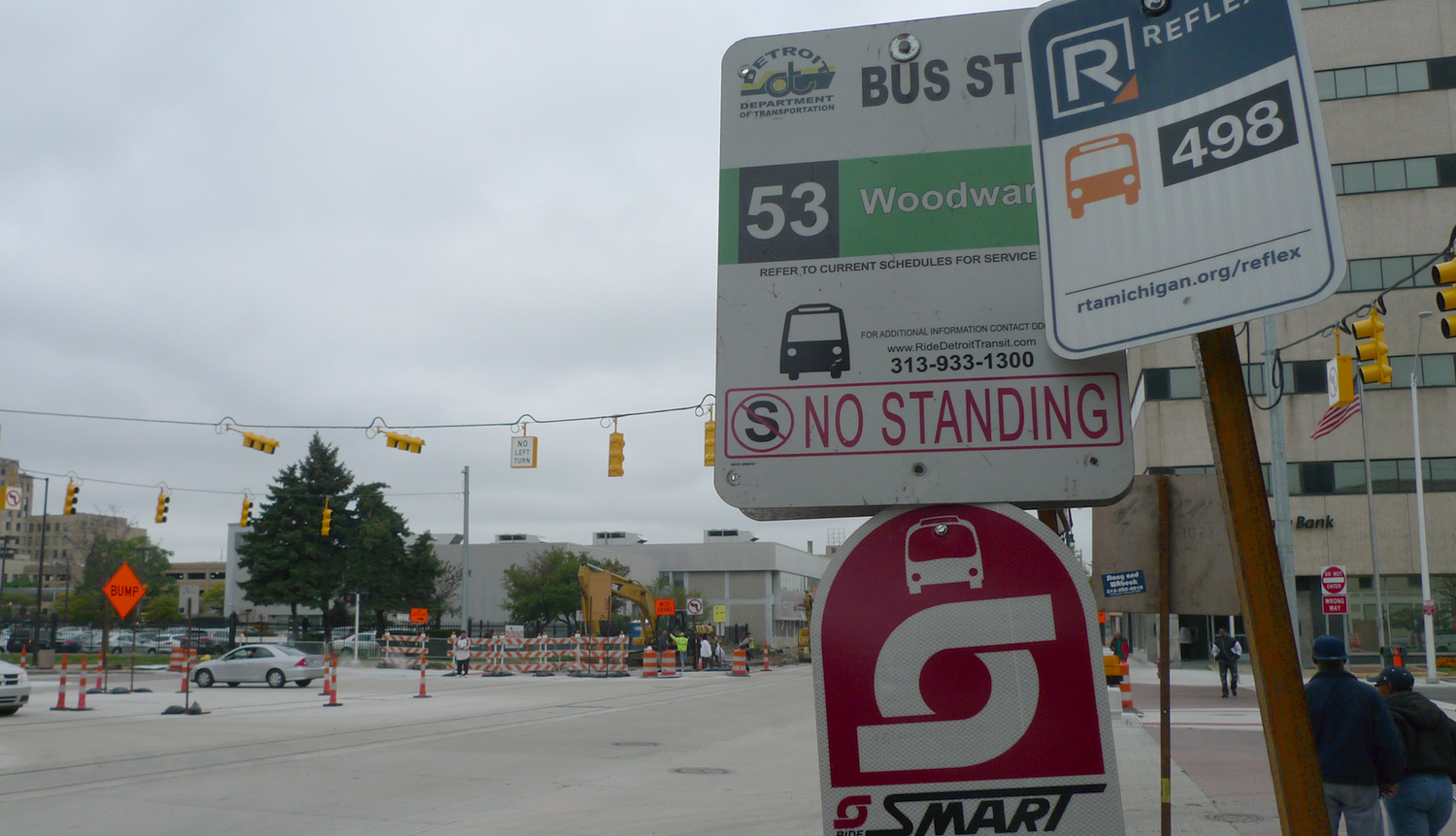  A vote to fund the RTA would marry DDOT and SMART, the city and suburban bus services. Those buses, and the RTA’s new RefleX service, all travel along Woodward Avenue. (Bridge photo by Nancy Derringer)