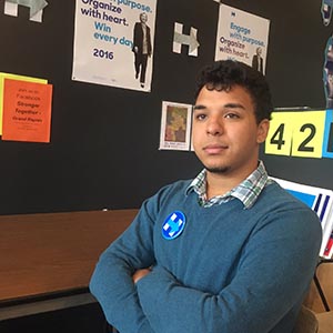 Julian Ayers, 21, a Grand Rapids volunteer for Hillary Clinton: “Now is not the time to throw away your vote.” (Photo by Ted Roelofs) 
