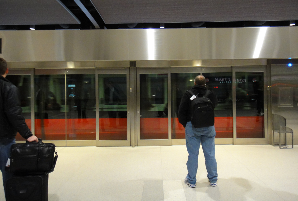 Outside those doors, the competition is fierce. As ride-sharing via smartphone apps gains popularity, especially in airport ground transportation, lawmakers are scrambling to sort it out with legislation. (Photo via Flickr/Creative Commons)