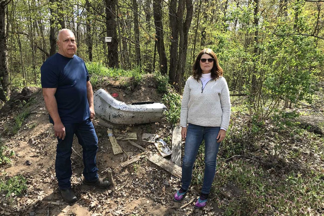 Glenn and Barb Cazier live next to the Rogue River State Game Area, and have grown increasingly frustrated with worsening trash, safety issues and resource damage as the area has grown more popular as a target-shooting spot for gun owners. (Bridge photo by Kelly House)