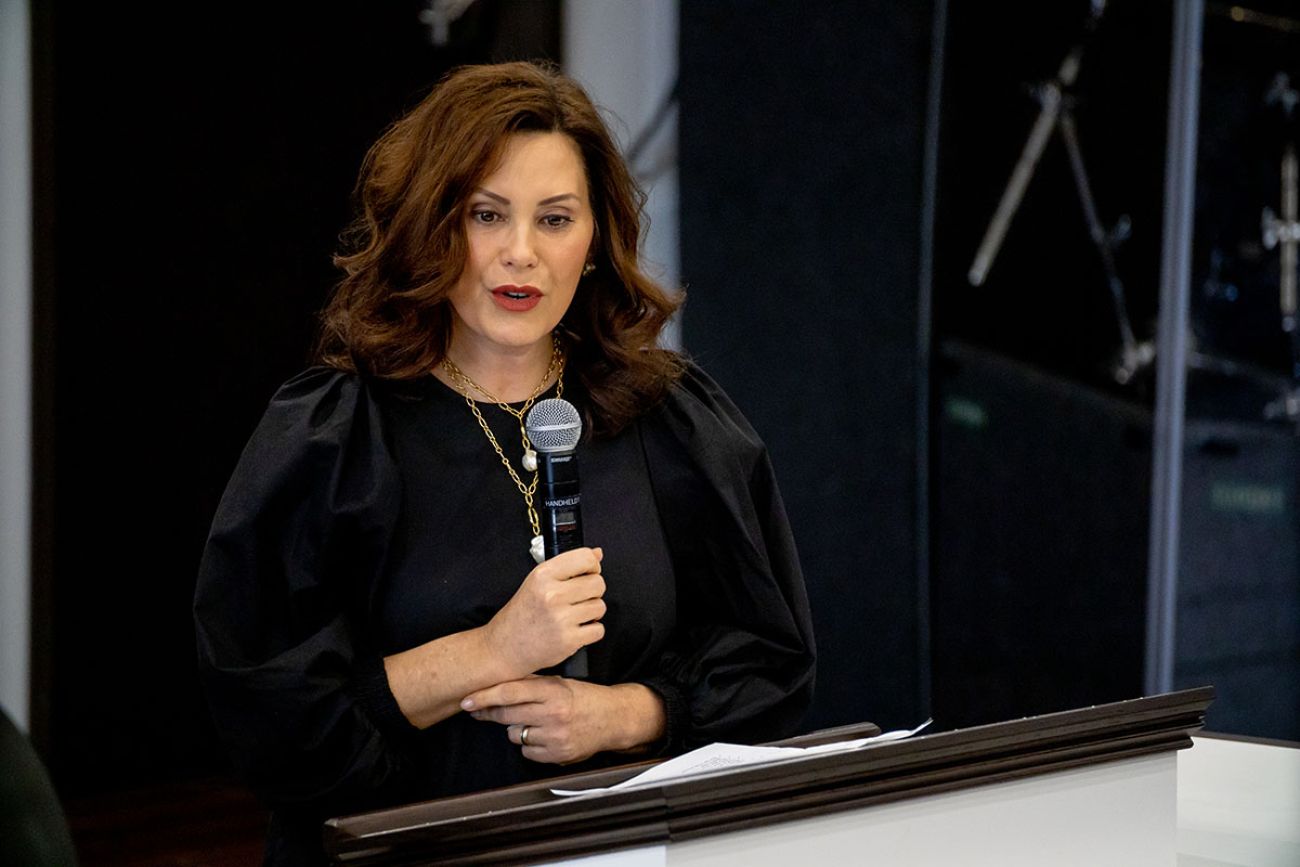 gretchen whitmer talking into a microphone