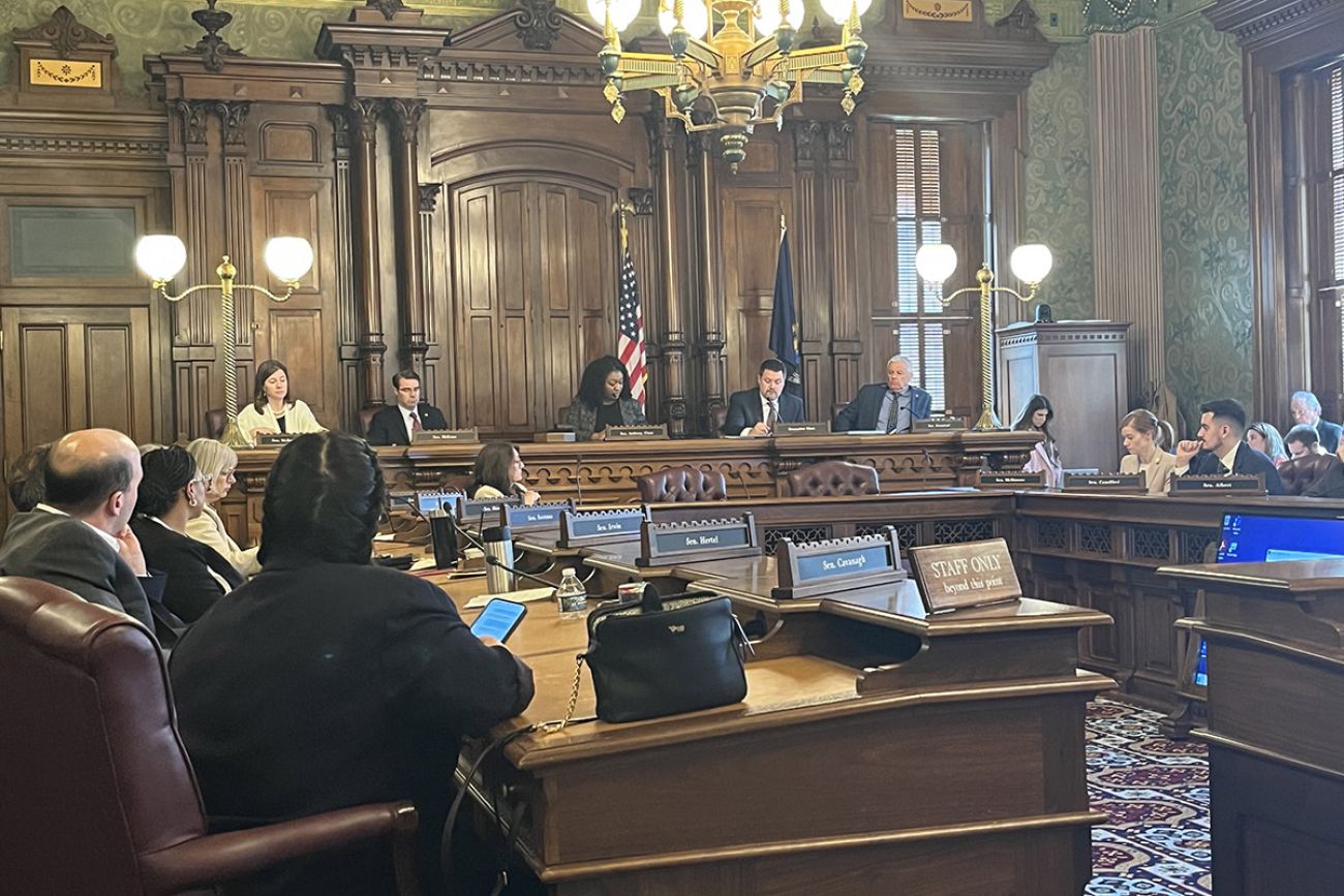 Senate Appropriations Committee meeting room; lawmakers sitting in chairs