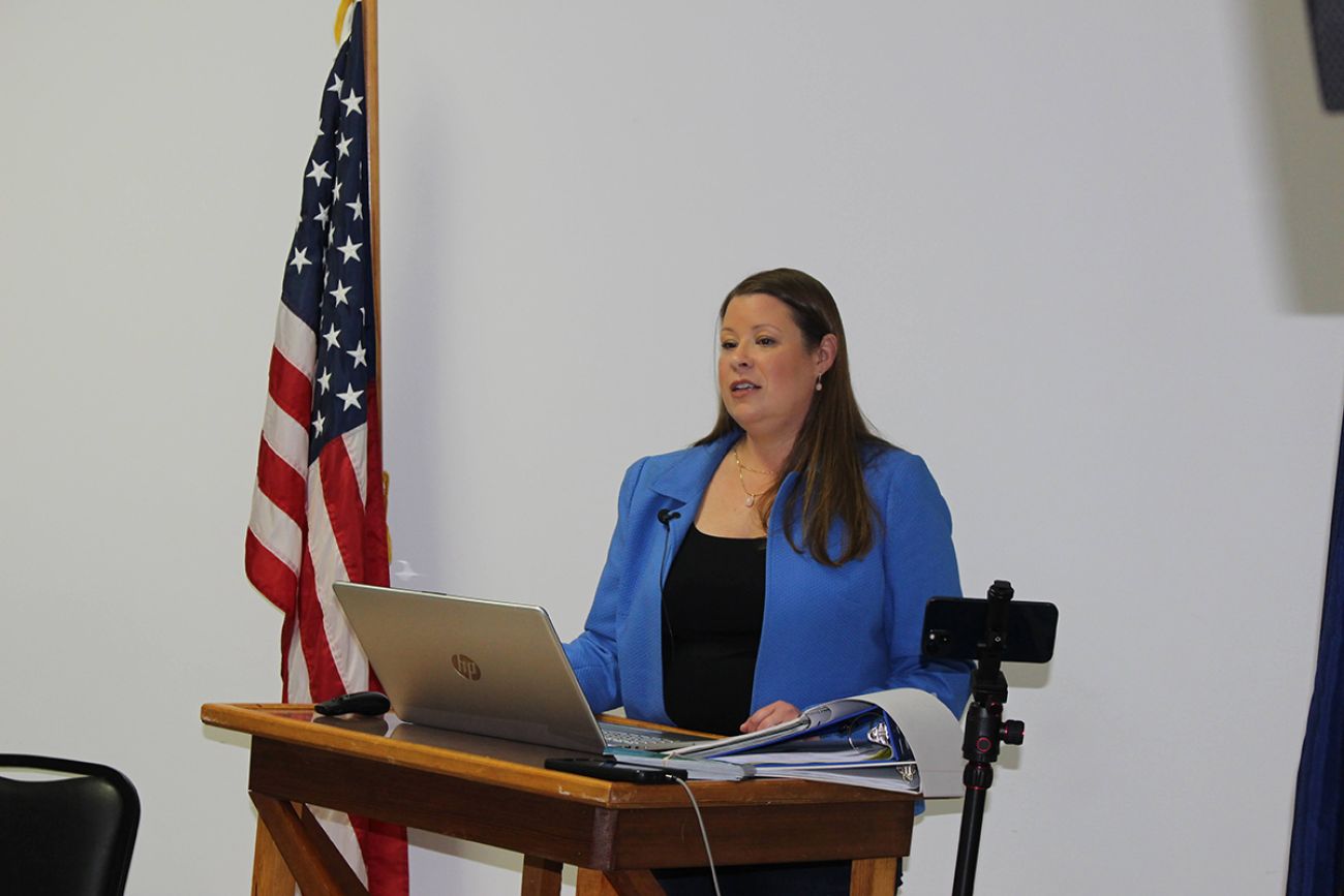 Stefanie Lambert at a podium