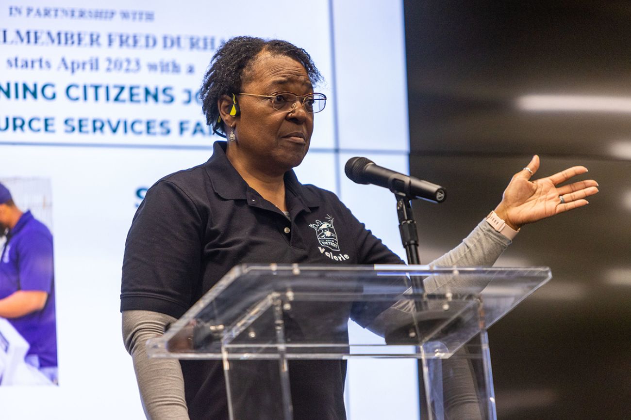 Valerie Pilot talking into a microphone