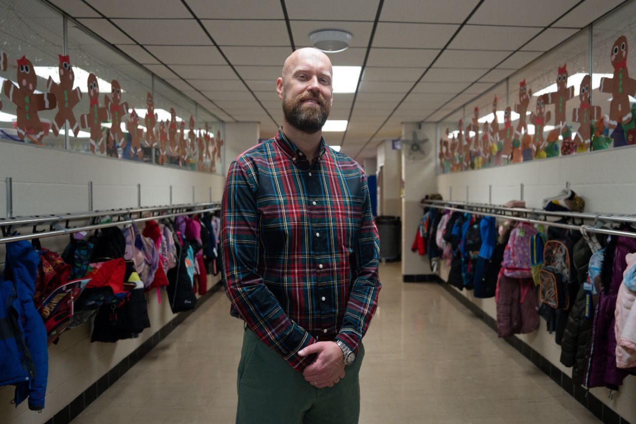 Man stands in hallway