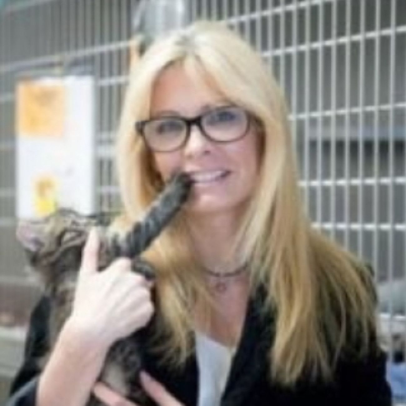 Woman holds cat