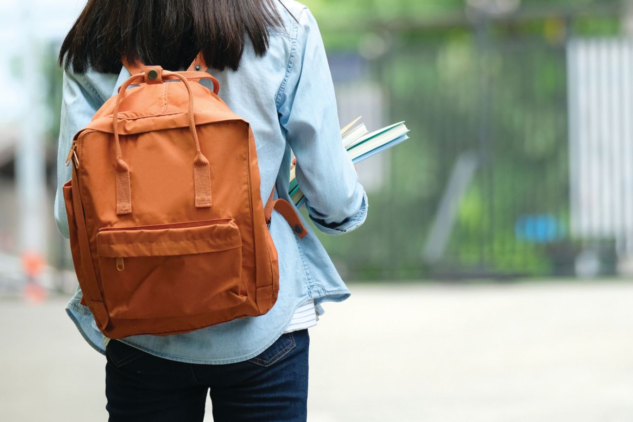 student with a backpack