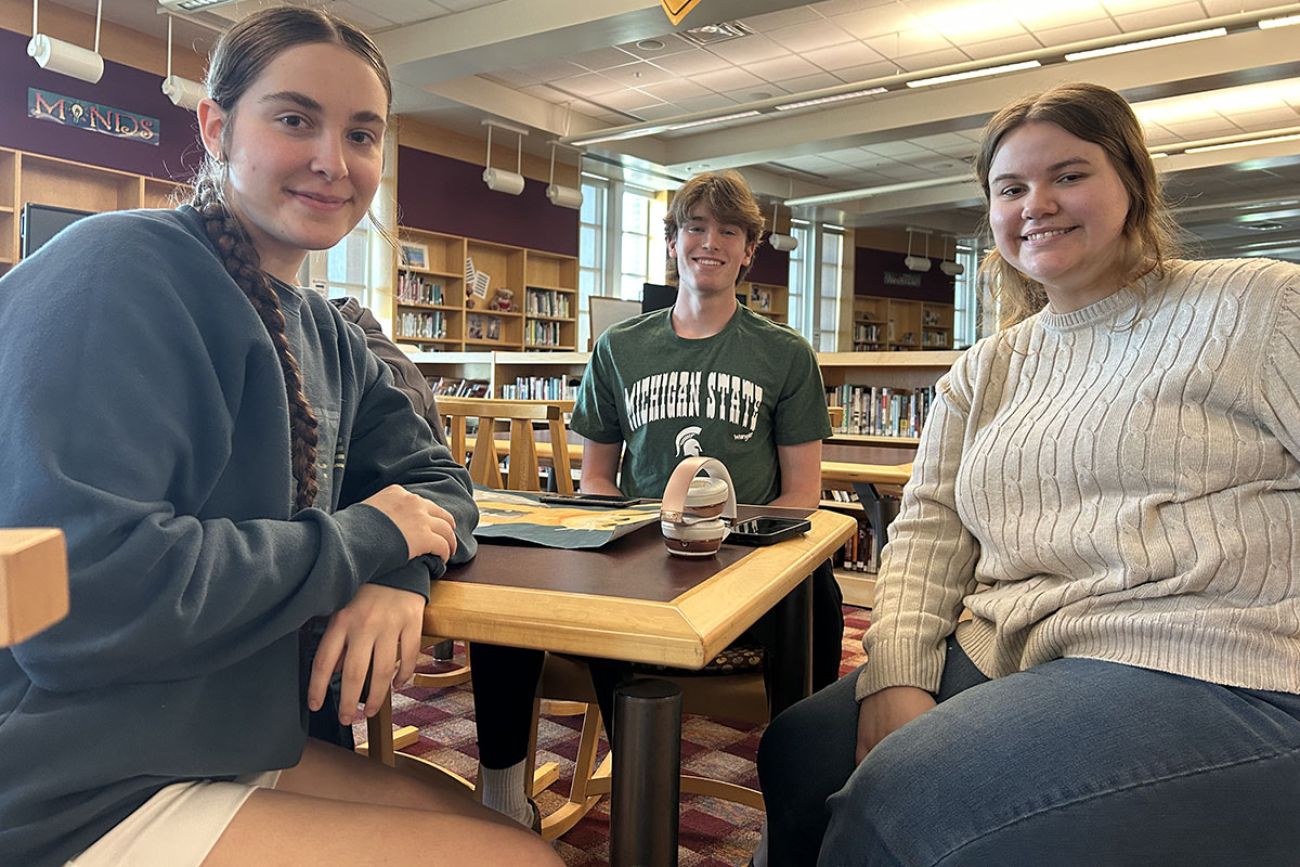 students sitting at a table