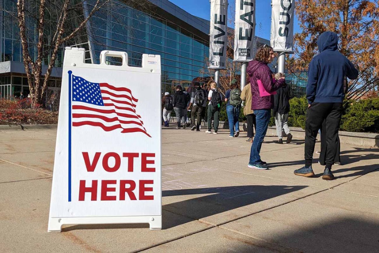 People walk into a voting location