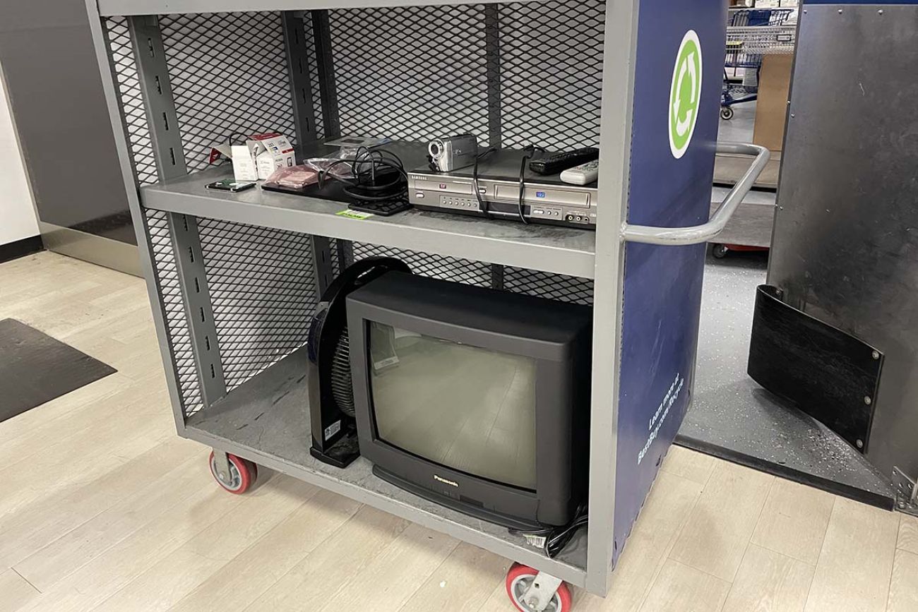 A cart with an old TV
