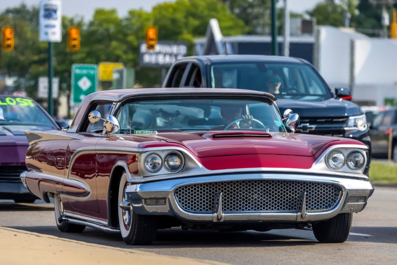 Cruisers show at Woodward dream cruise. In front is a red classic car