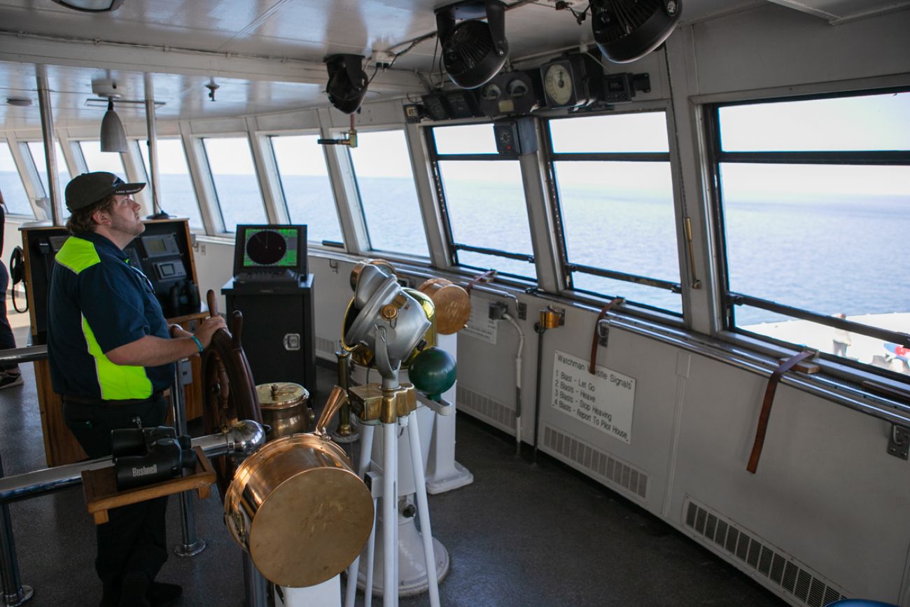 A man steering the SS Badger