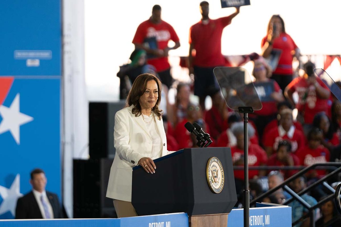 Kamala Harris at a podium in metro Detroit