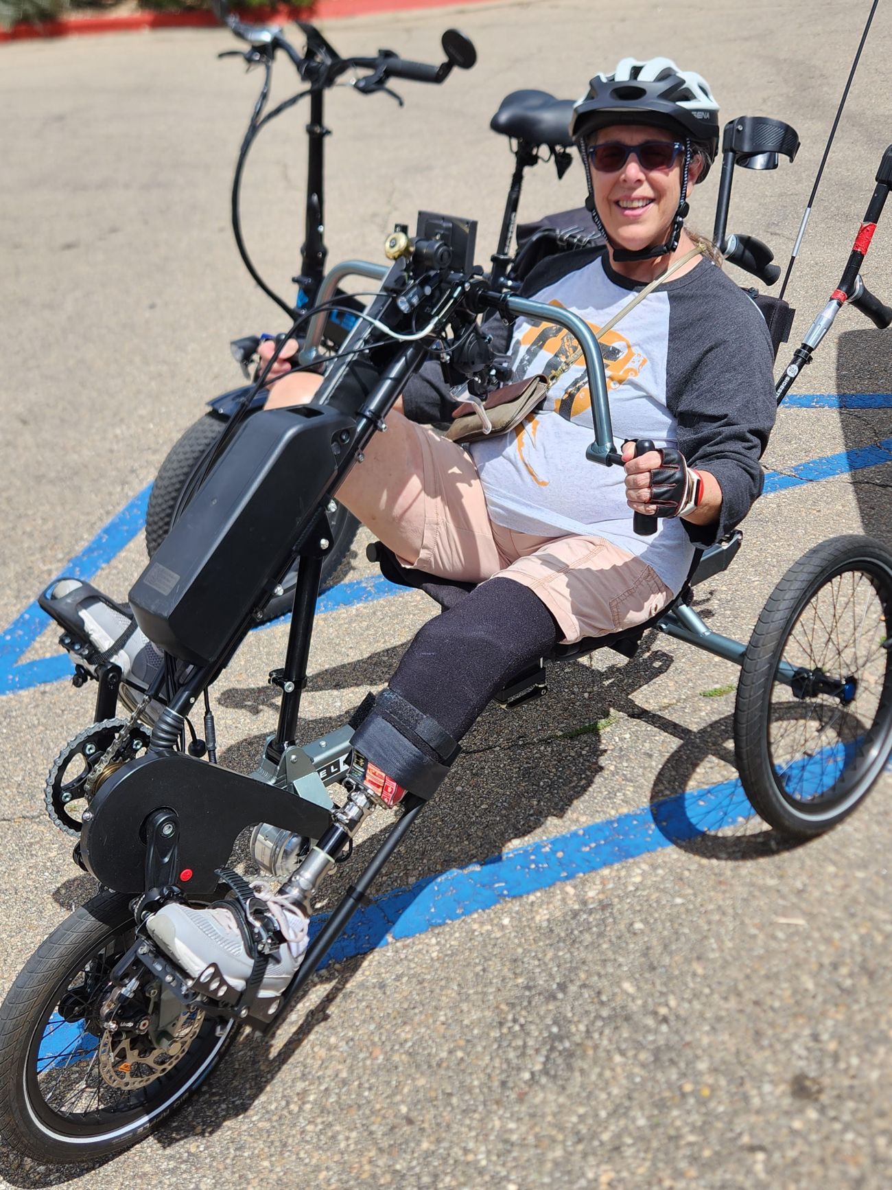 Beth Hudson in a modified tricycle, which is low to the ground