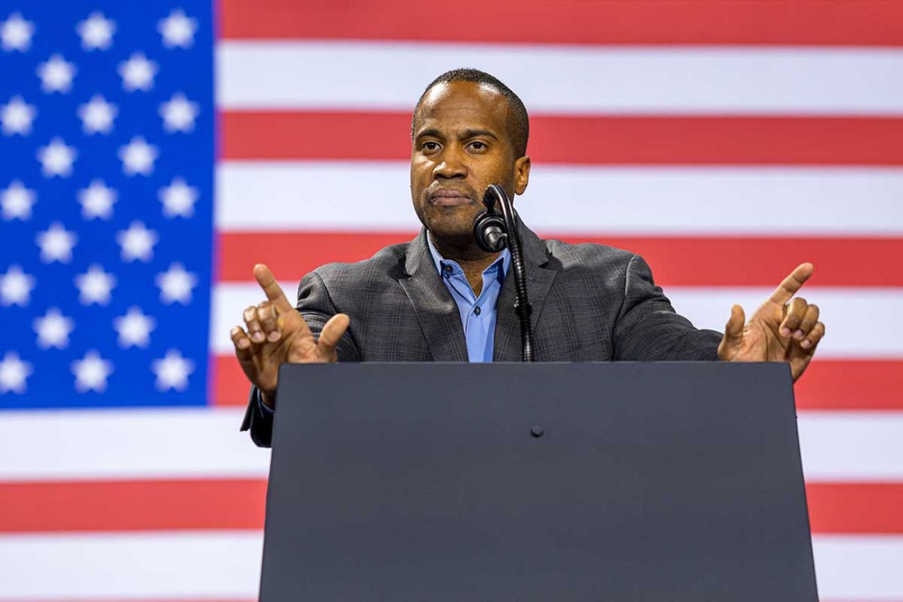 John James speaking at a podium